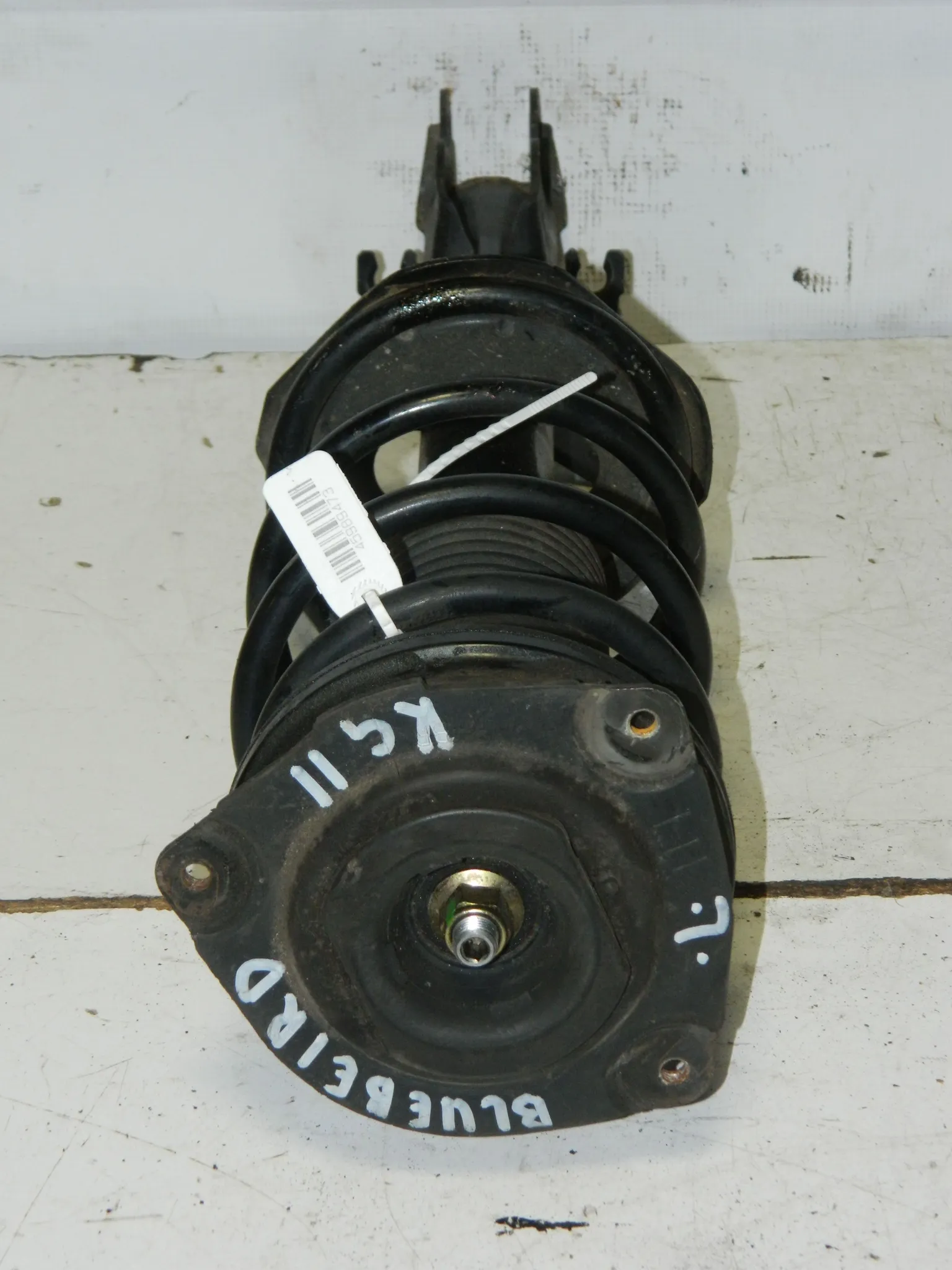 Стойка подвески NISSAN BLUEBIRD KG11 Перед Лев (Контрактный) 45989473