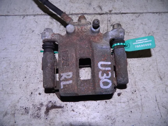 Суппорт NISSAN PRESAGE U30 Зад Лев (Контрактный) 79590050