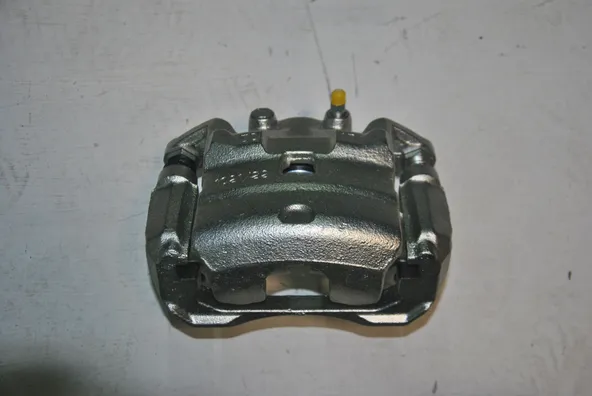 Суппорт тормозной GENERAL PARTS 41011JN00A NISSAN TEANA J32, JUKE F15 Перед Лев