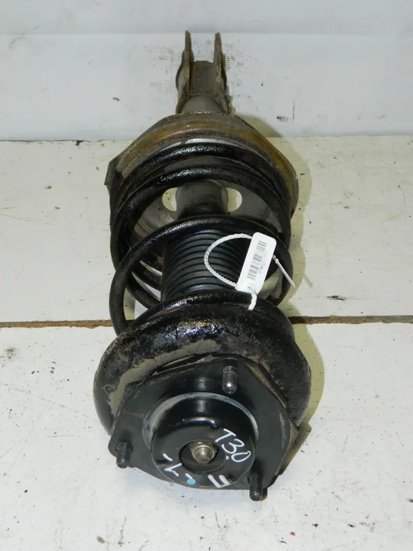 Стойка подвески NISSAN X-TRAIL NT30 Зад Лев (Контрактный) 45989351