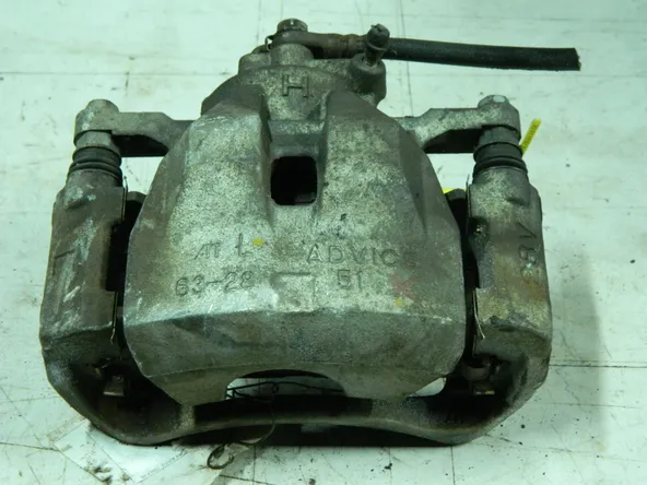 Суппорт тормозной TOYOTA CAMRY AVV50 Перед Лев (Контрактный) 94603744