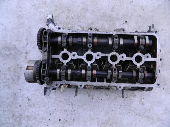 Головка блока цилиндров  KIA G4FC Cerato 2007 г (б/у) 79768994