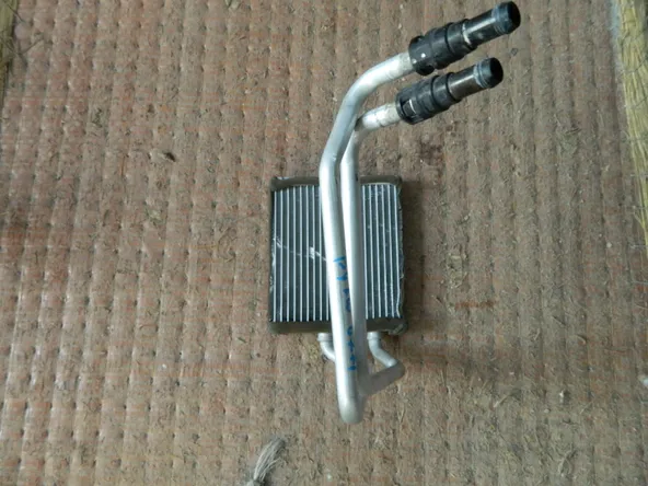Радиатор печки MAZDA DEMIO DY3W (Контрактный) 1001570020