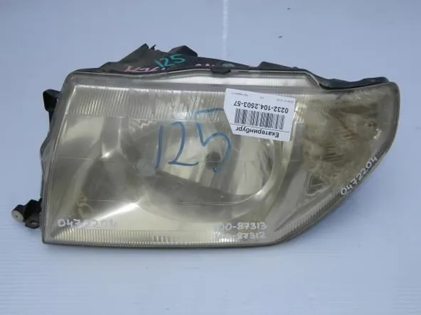 Фара MITSUBISHI PAJERO iO H76W Перед Лев (Контрактный)