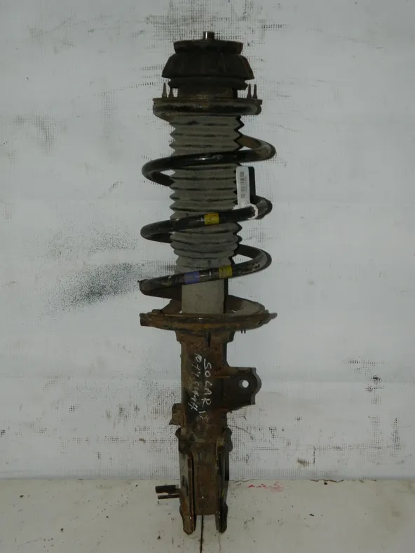 Стойка подвески HYUNDAI SOLARIS RB Перед Лев (Контрактный) 35023356