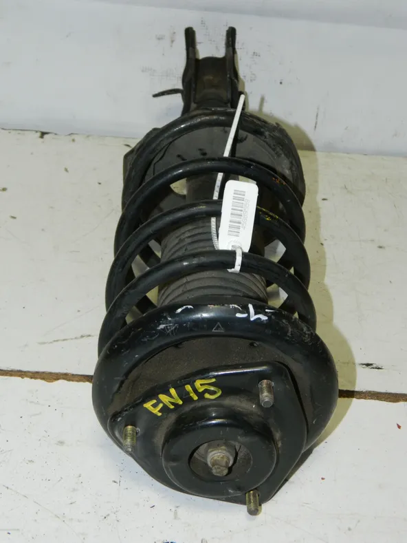 Стойка подвески NISSAN PULSAR FN15 Перед Лев (Контрактный) 45989559