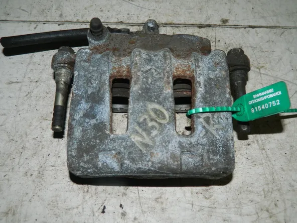 Суппорт тормозной NISSAN RNESSA N30 Перед Прав (Контрактный) 79773378
