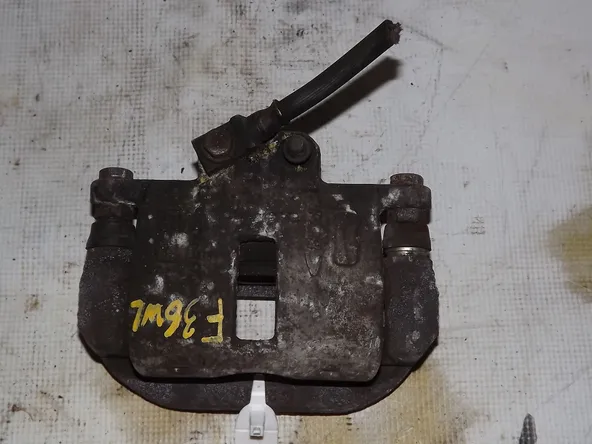 Суппорт MITSUBISHI DIAMANTE F36W Зад Лев (Контрактный) 35017430