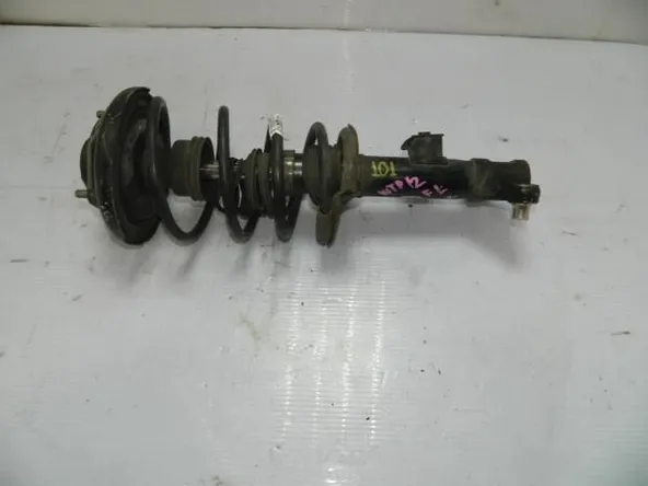 Стойка подвески NISSAN PRIMERA WTP12 Перед Лев (Контрактный) 45989141