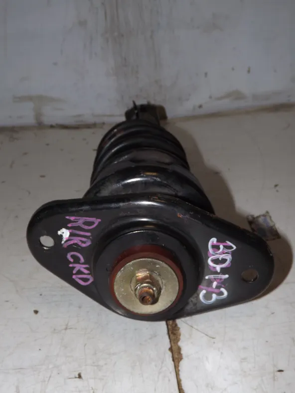 Стойка подвески MINI COOPER R50 Задн Лев (Контрактный) 35023205