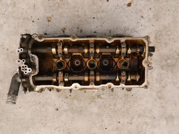 Головка блока цилиндров NISSAN VQ23DE Лев (Контрактный) 79768966