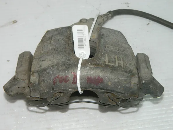 Суппорт тормозной FORD FOCUS 2 Перед Лев 45992337 Б/У