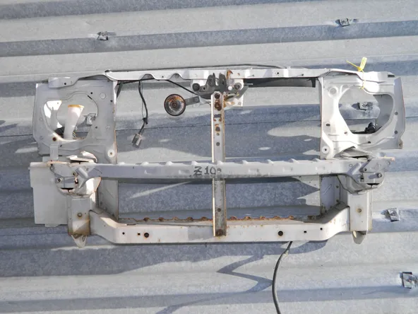 Рамка радиатора NISSAN CUBE Z10 (Контрактный) 79780715