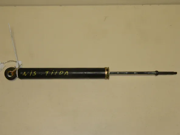 Амортизатор NISSAN TIIDA C11 Зад (Контрактный)