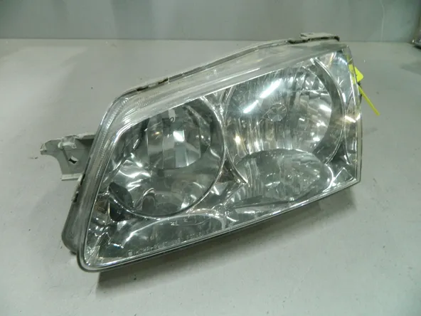 Фара MAZDA FAMILIA BJFW Перед Лев 0746 (Контрактный) 64492750