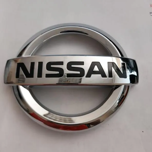 Эмблема NISSAN 628904EM0A NISSAN QASHQAI Перед