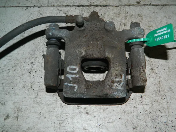 Суппорт NISSAN QASHQAI J10 Зад Лев (Контрактный) 81540181