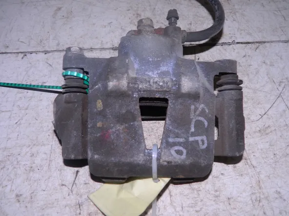 Суппорт TOYOTA VITZ SCP10 Перед Лев (Контрактный) 81540005