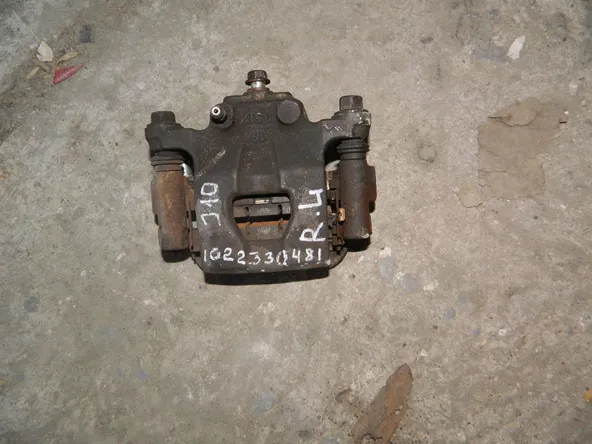 Суппорт NISSAN QASHQAI J10 Зад Лев (Контрактный) 1022330481