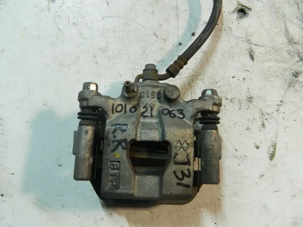 Суппорт NISSAN TEANA J31 Зад Прав (Контрактный) 101021063