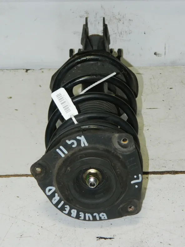 Стойка подвески NISSAN BLUEBIRD KG11 Перед Лев (Контрактный) 45989473